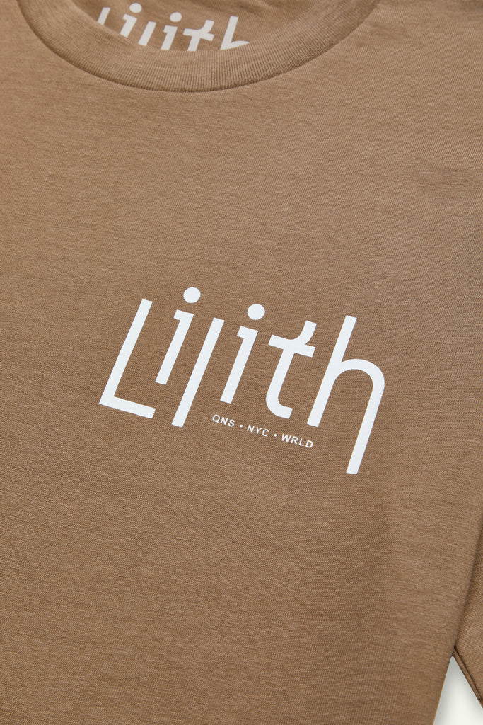 A light brown or coffee crewneck t-shirt with the Lilith NYC wordmark logo screen printed on the upper left chest area. The logo color is white.